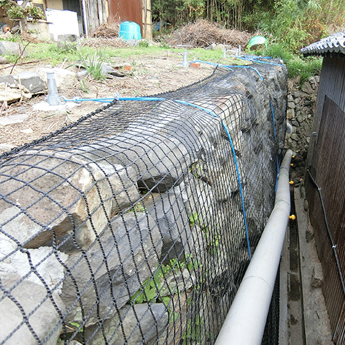 香川県高松市の落石防止ネット（既設石積み壁）の施工・製作事例